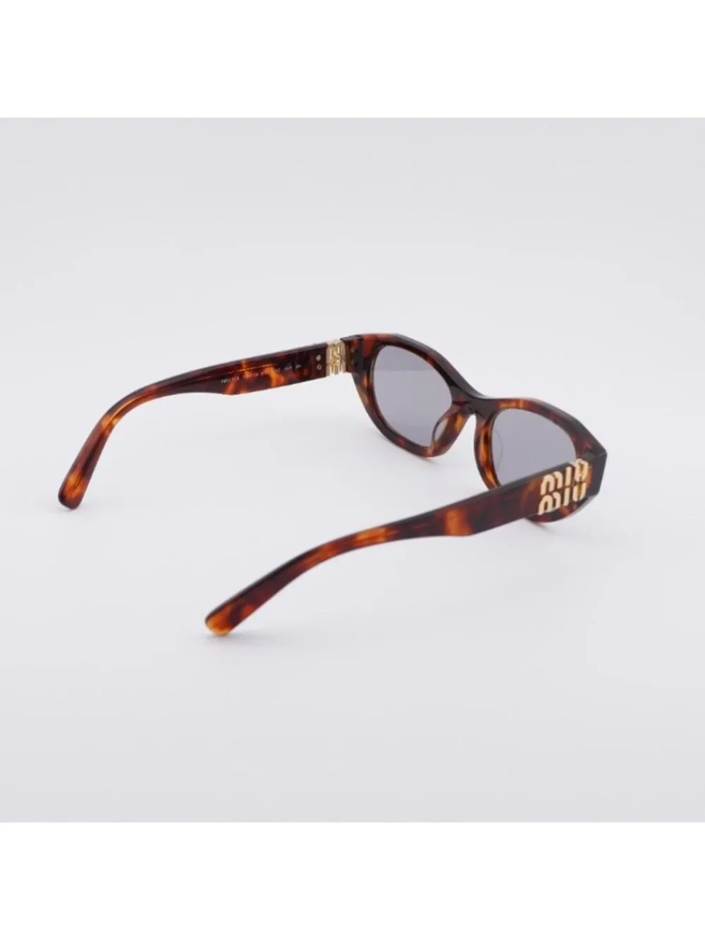 Miu Miu MUA03S 21C40O Sunglasses Havana Mahogany Oval Frame, Grey Lenses